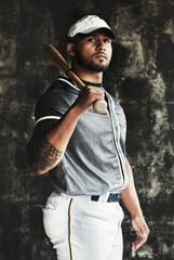 Sport, fitness and baseball player with bat looking cool, focus and ready for competitive training....