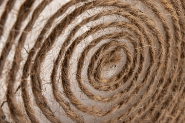close-up of brown jute twine for DIY and gift wrapping, isolated on white background, concept of zero waste or sustainable lifestyle.