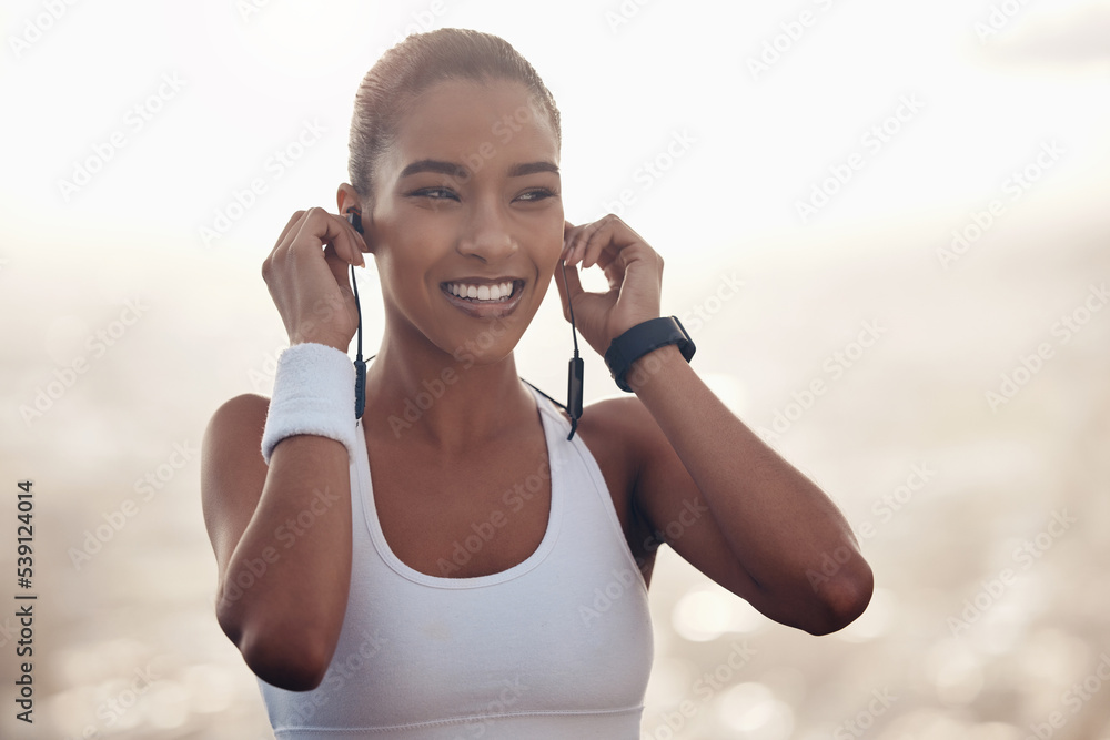 Poster Music, fitness and black woman training in the city with motivation from podcast for a run. Happy, smile and thinking athlete runner with the radio on earphones during workout and exercise in nature