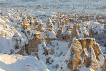 Nevsehir, Turkey, February, 01, 2022: Pigeon Valley and Cave town in Goreme during winter time. Cappadocia, Turkey. 