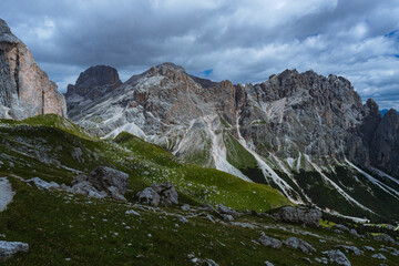 Fototapeta na wymiar The landscape and the peaks of the Dolomites of the Val di Fassa, one of the most famous and touristic valleys of Trentino, near the town of Canazei, Italy - August 2022.