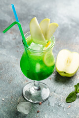 Summer sparkling cocktails. Hard seltzer cocktails with lemon, orange and mint. Glass of cold drink. vertical image. place for text