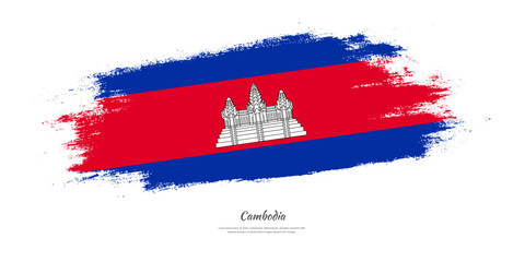Happy Independence Day of Cambodia. National flag on artistic stain brush stroke background.