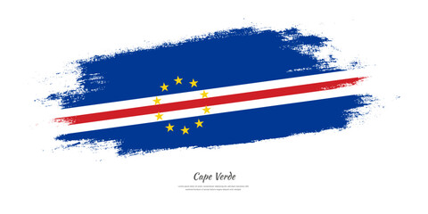 Happy Independence Day of Cape Verde. National flag on artistic stain brush stroke background.