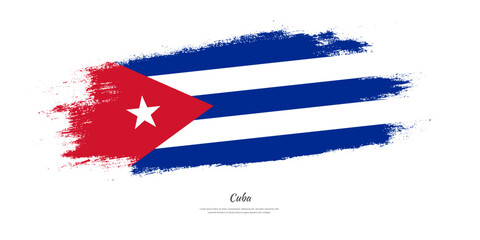 Happy Independence Day of Cuba. National flag on artistic stain brush stroke background.