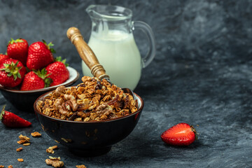 Bowl with granola on a blue background. superfood concept. Healthy, clean eating. Vegan or gluten free diet. Long banner format. top view