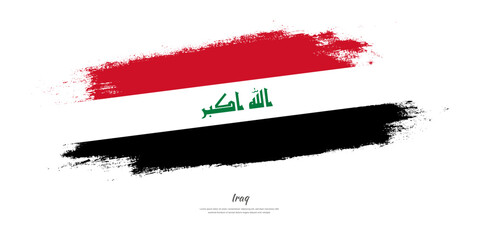 Happy Independence Day of Iraq. National flag on artistic stain brush stroke background.