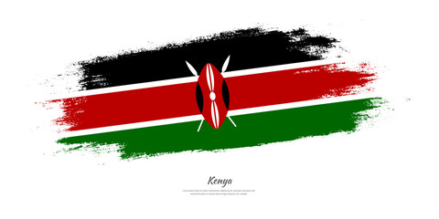 Happy Independence Day of Kenya. National flag on artistic stain brush stroke background.