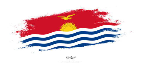 Happy Independence Day of Kiribati. National flag on artistic stain brush stroke background.