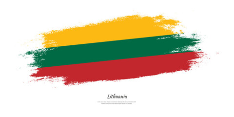 Happy Independence Day of Lithuania. National flag on artistic stain brush stroke background.