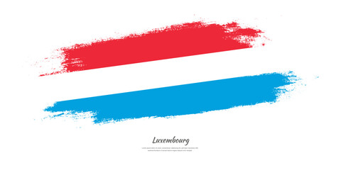 Happy National Day of Luxembourg. National flag on artistic stain brush stroke background.