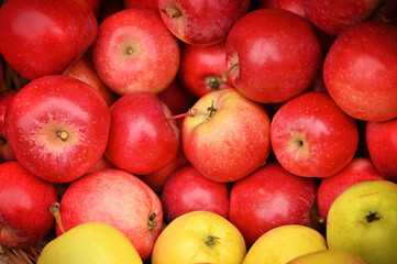 Fresh ripe red apples as background