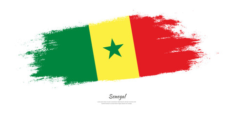 Happy Independence Day of Senegal. National flag on artistic stain brush stroke background.