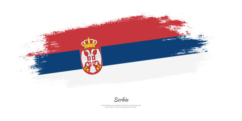 Happy Independence Day of Serbia. National flag on artistic stain brush stroke background.