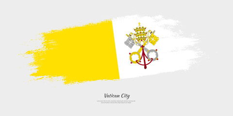 Happy National Day of Vatican City. National flag on artistic stain brush stroke background.