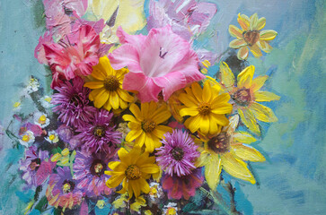 Yellow and purple autumn flowers on a turquoise background.