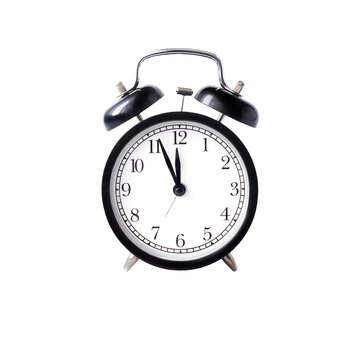 black alarm clock with white dial