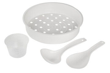 white lattice for a multicooker with plastic spoons for cooking on transparent background