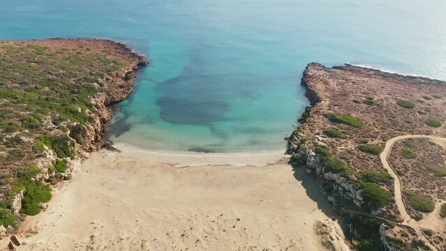 Empty Natural Cove Paradise Of Calamosche Beach In Siracusa, Italy. Aerial Drone Shot 