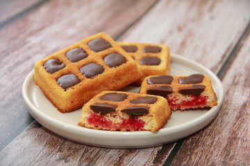 sweet baked Viennese waffles with chocolate filling in a decorative ceramic plate