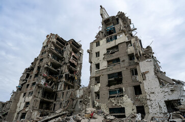 destroyed and burned houses in the city during the war in Ukraine