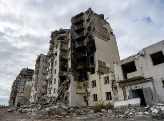 destroyed and burned houses in the city during the war in Ukraine