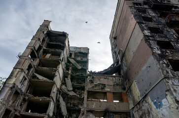 destroyed and burned houses in the city during the war in Ukraine