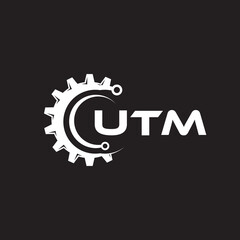 UTM letter technology logo design on black background. UTM creative initials letter IT logo concept. UTM setting shape design.

