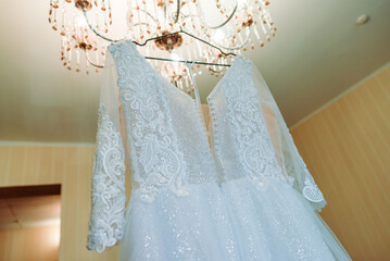 wedding dress in the room of the bride