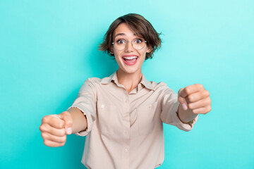 Photo of young crazy excited screaming lady driving abstract imagine steering wheel good mood high speed isolated on aquamarine color background