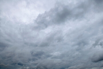 Storm clouds floating in a rainy day with natural light. Cloudscape scenery, overcast weather....