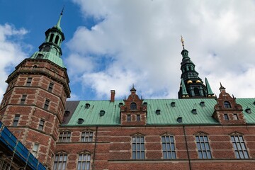 Historic beautiful Frederiksborg Castle facade in downtown Hilerod, Denmark