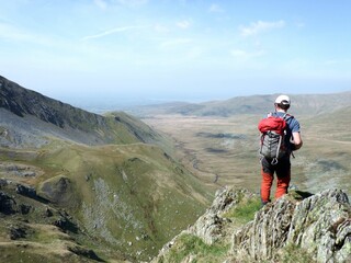 Scotland, Snowdonia. Hiking and climbing ridges through the wilderness during Spring time. Some days are sunny some days are rainy, but all of them are an adventure
