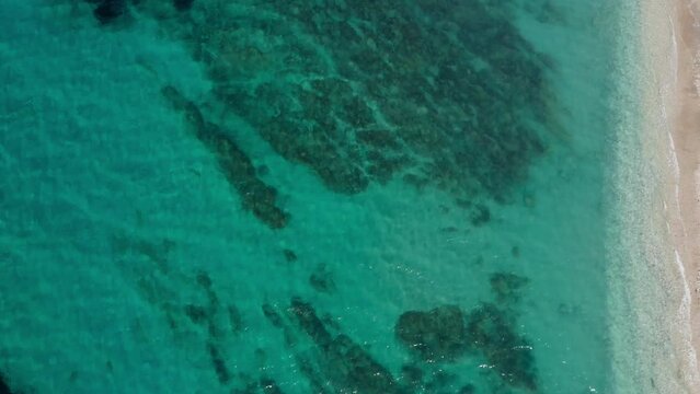 Top Down Aerial of Albanian Beach with beautiful crystal clear water