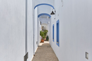 traditional alley in the town of in Olhao, Algarve, Portugal