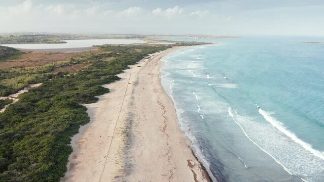 Idyllic Seascape At Riserva naturale orientata Oasi Faunistica di Vendicari Nature Preserve In Italy - drone shot