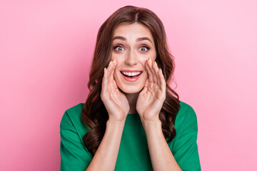 Photo of impressed optimistic funny girl with wavy hairdo dressed green t-shirt whispering secret...