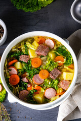 delicious savoy cabbage soup in white vase