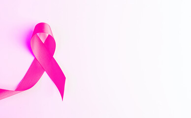 Cancer background. Health care symbol pink ribbon on white background. Breast cancer woman support with copy space.