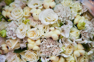 The composition is made by florists from fresh flowers at the party, wedding or celebration.