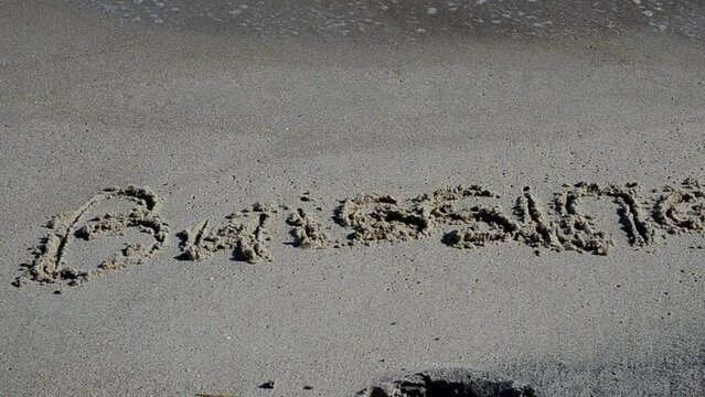 Word business. Inscription on sand.
