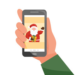 Online celebration of Christmas - greetings from Santa in smartphone