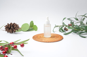 Fototapeta na wymiar moisturizing cream bottle over leaf background studio, packing and skincare beauty concept.