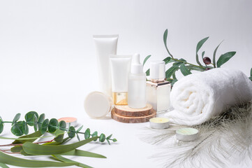 moisturizing cream bottle over leaf background studio, packing and skincare beauty concept.