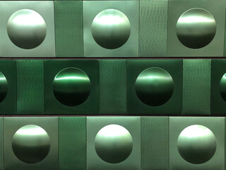 Concave circle background with different shades of metallic green