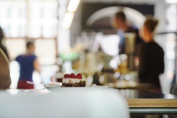 Blur coffee shop or cafe restaurant with abstract bokeh light image background.