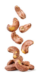 Cashew in the shell falls on a pile on a white background. Isolated