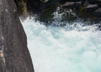 water flowing into the waterfall