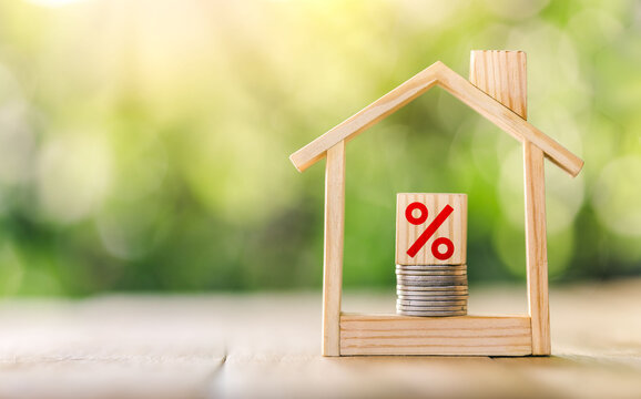 Mortgage rates business concept of investment housing real estate interest rates 3d home appraisal. planning savings money of coins to buy a home concept for property ladder, mortgage, real estate.