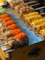 Close up of Japan local food in Hachinohe morning market call hamayaki Aomori Japan.